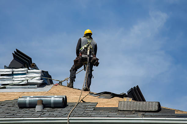 Professional Roof Replacement technician working in Milton Mills, NH